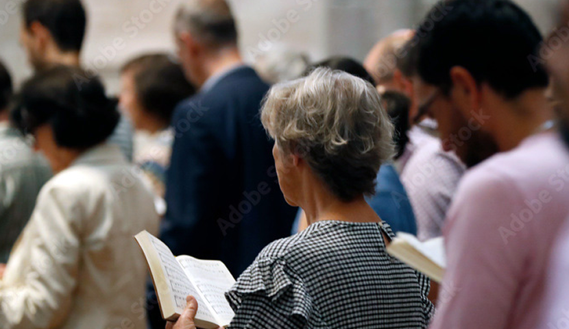A church congregation worshipping together, representing the church donors represented in the 2026 Giving in Faith report.