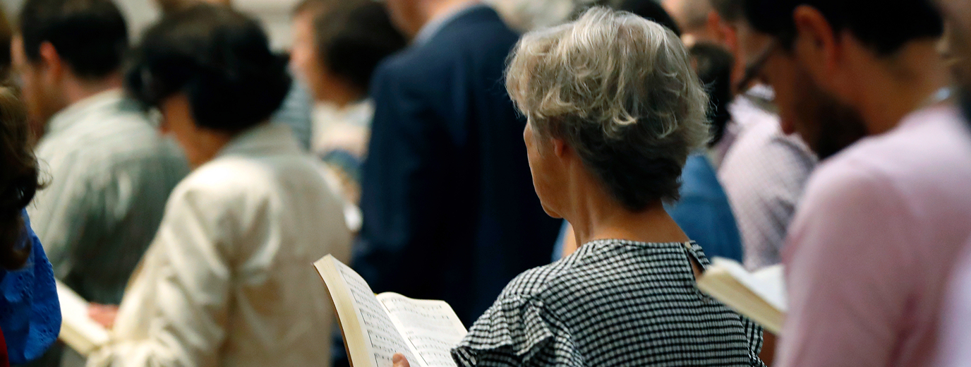 A church congregation worshipping together, representing the church donors represented in the 2026 Giving in Faith report.