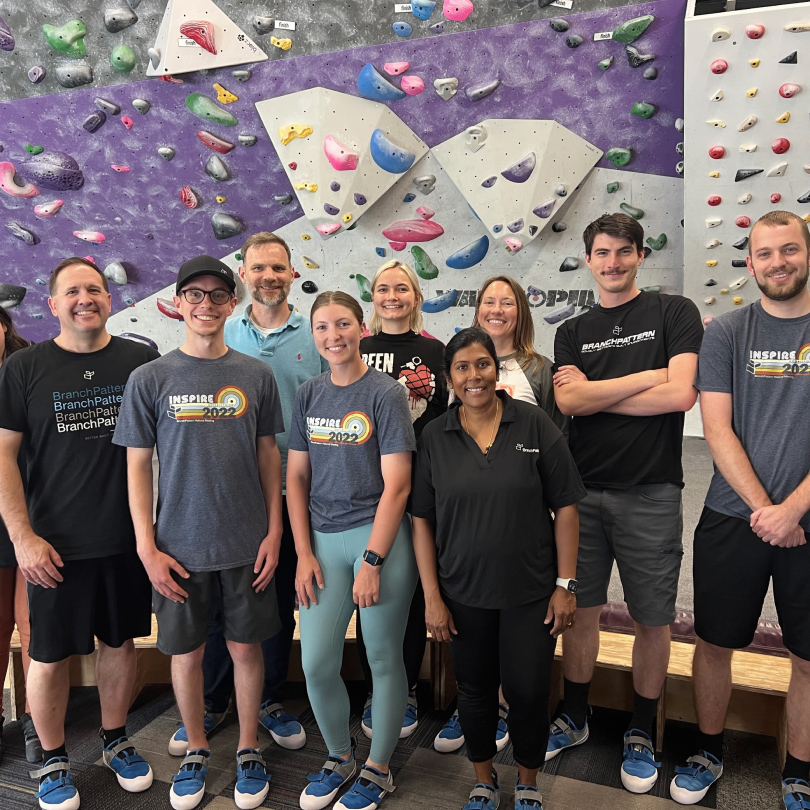 A group of people posing after an event,