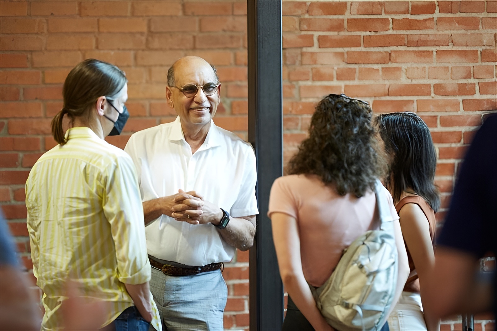 Photo of casual business conversation