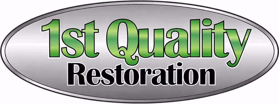 Logo with text '1st Quality Restoration' inside a silver oval with gradient fill, '1st Quality' in green and 'Restoration' in black.
