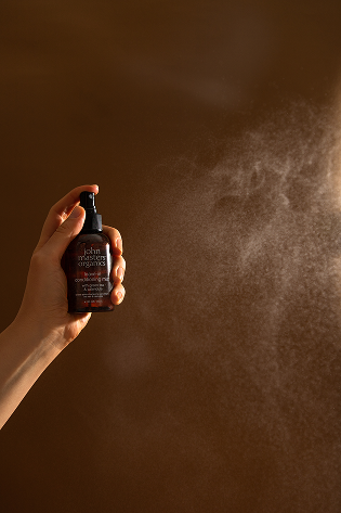 JohnMaster spray with brown background
