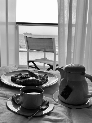 Breakfast with coffee in hotel room