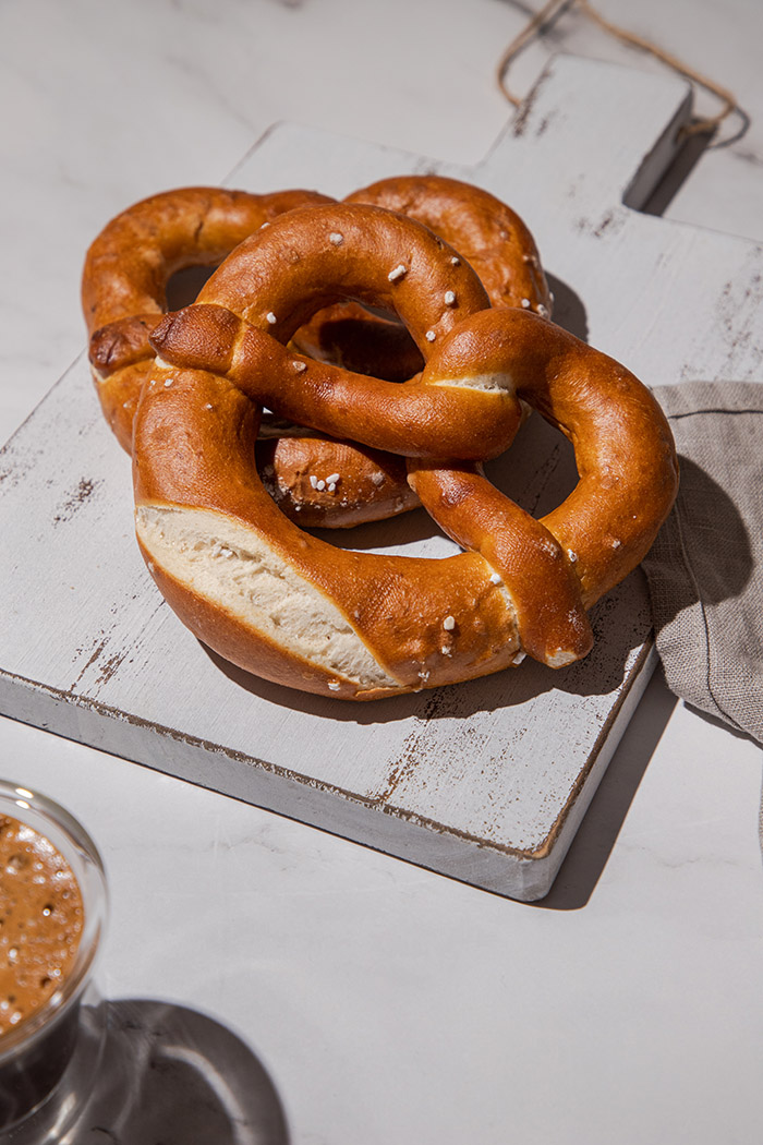 pretzels on a white serving board