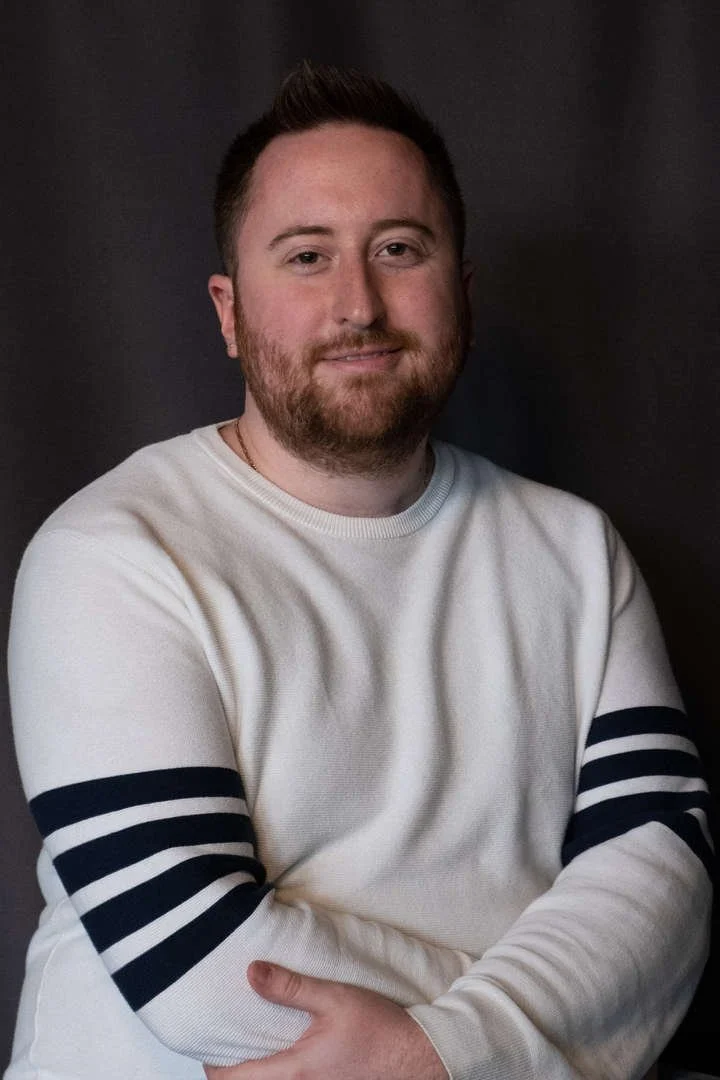 Staff member C Novak professional headshot portrait