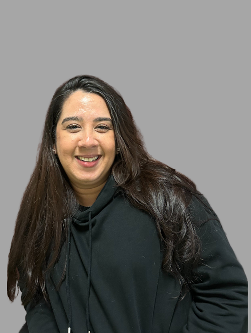 N. Oquendo smiling staff member portrait photo