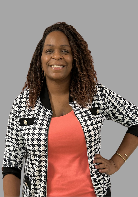 L Williams staff member smiling in professional headshot photo