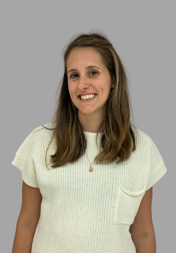 Staff member L Kemp smiling professional headshot portrait