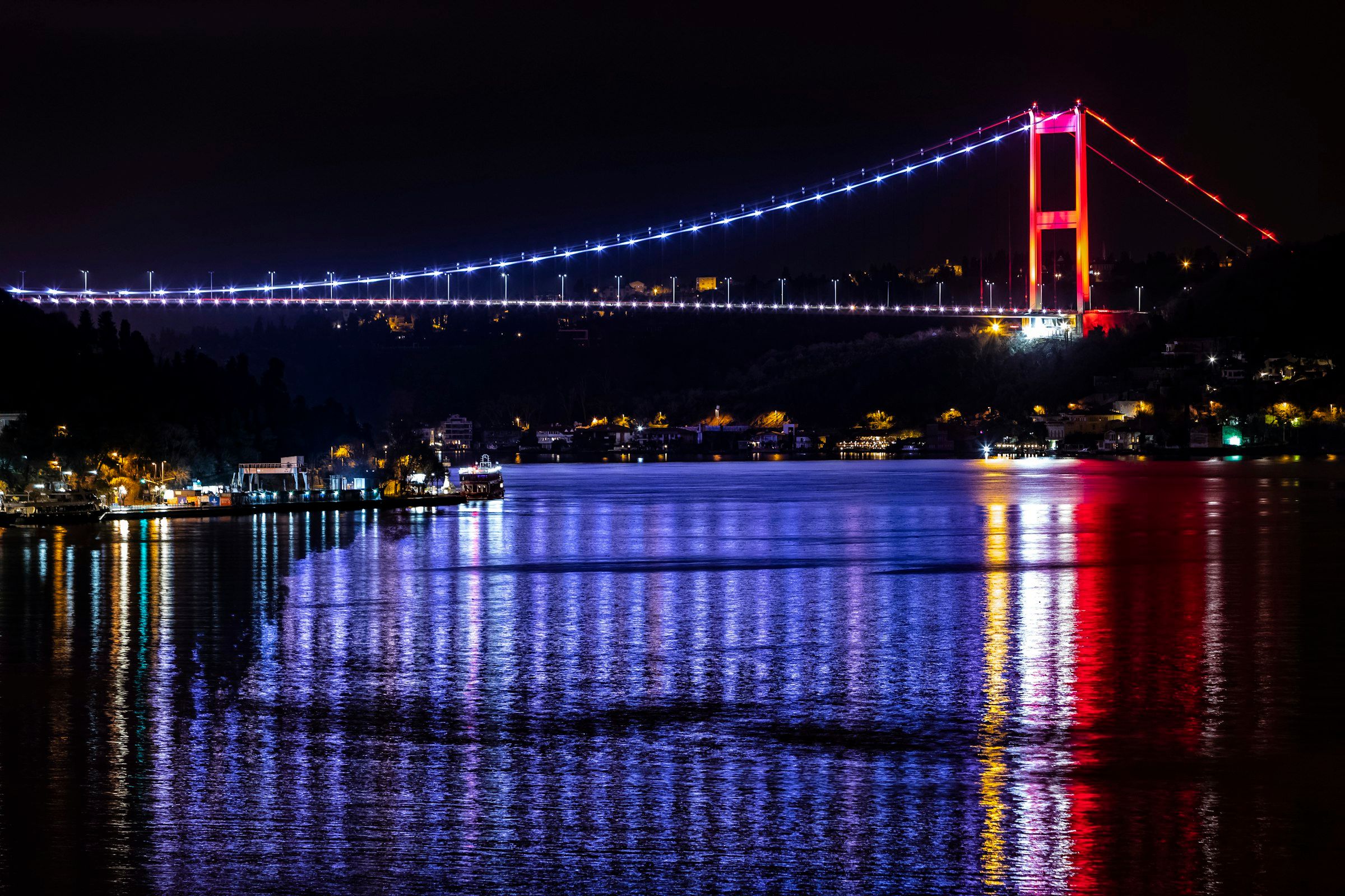 The Bosphorus Bridge lit at night, Istanbul, Turkey