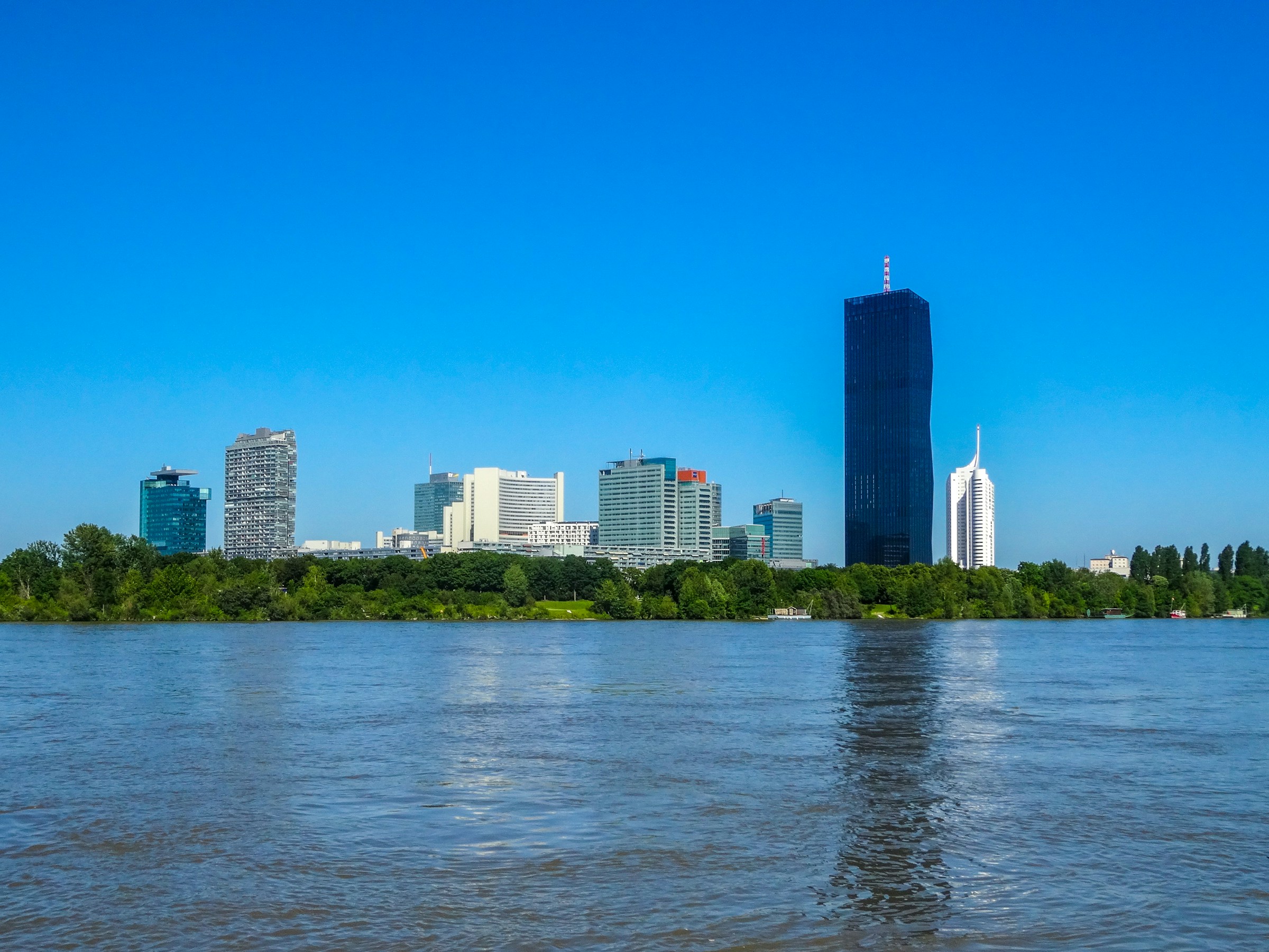 Towers along the Danube on a clear day, Vienna, Austria