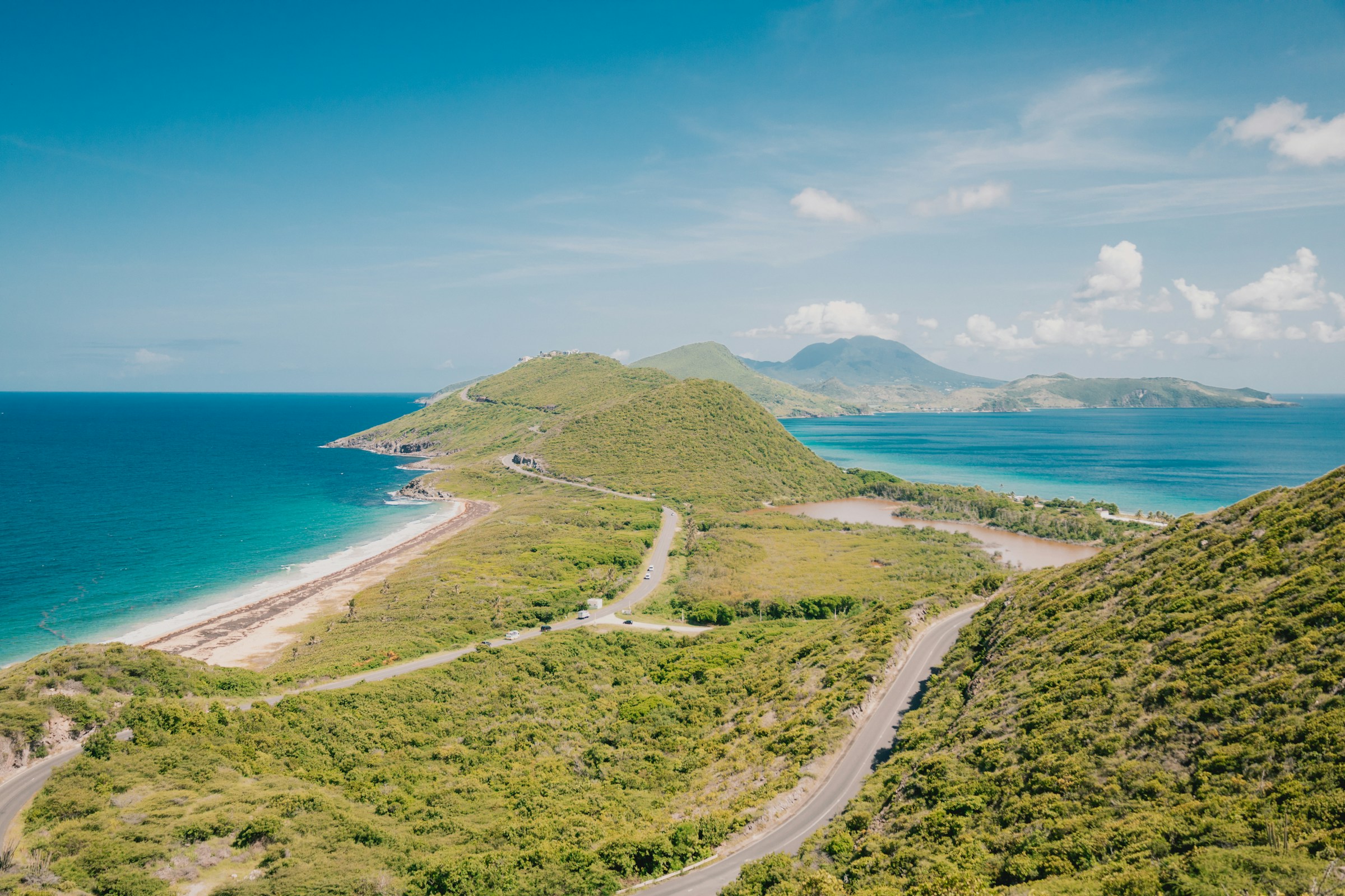 Coastal road above the shoreline in daylight, Saint Kitts and Nevis