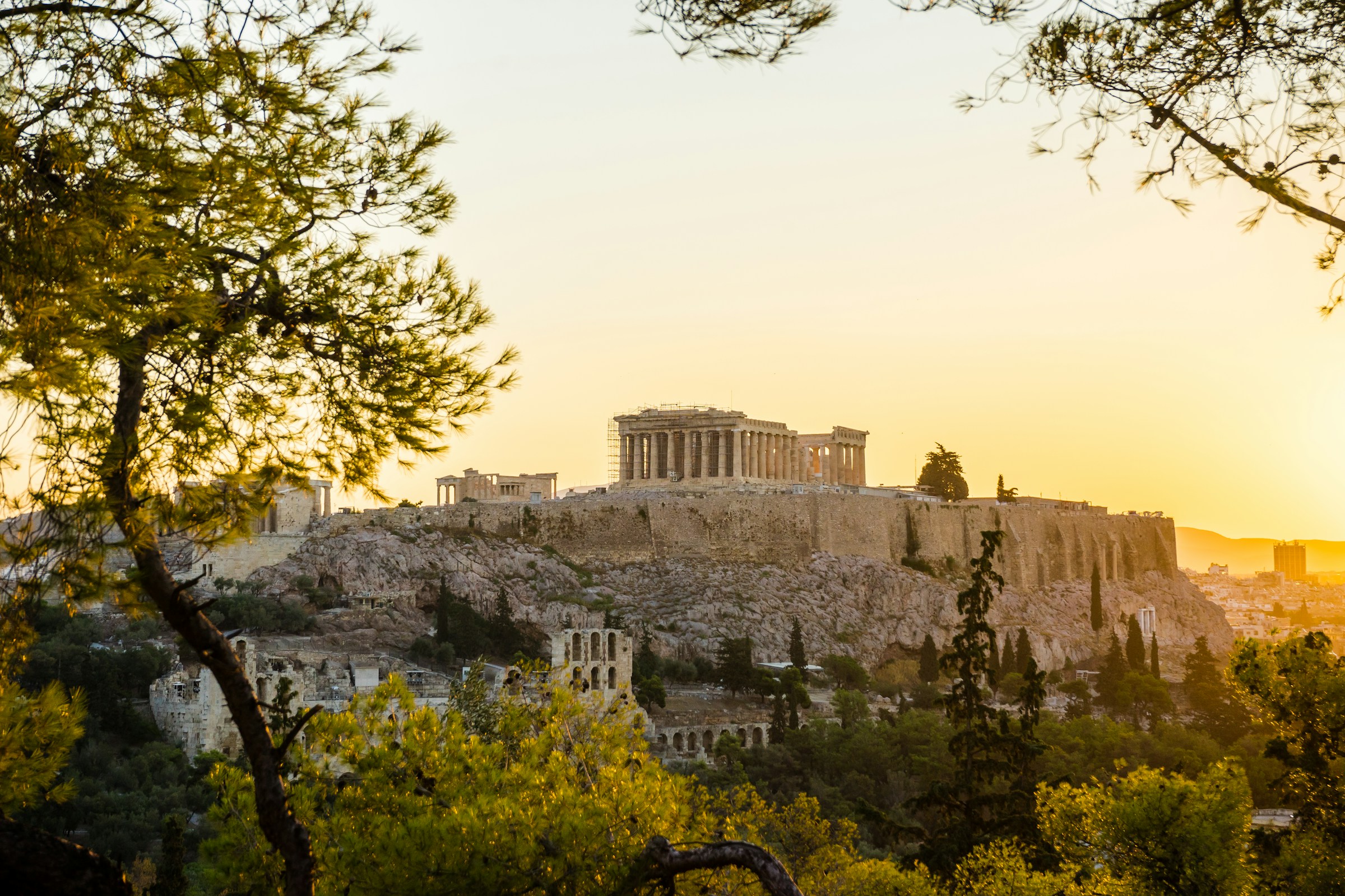 The Acropolis on its hill above Athens in daylight, Greece