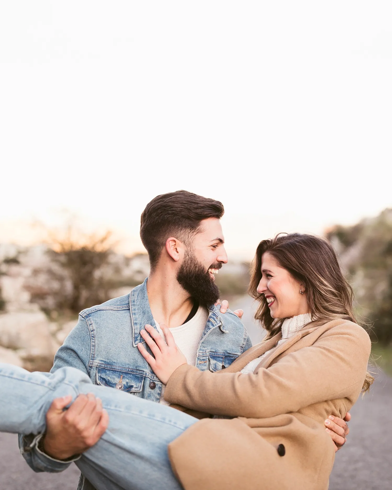 Happy couple reconnecting after betrayal trauma recovery therapy