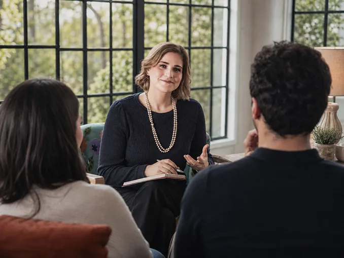 Dr. Cammy Froude leading a couples therapy session