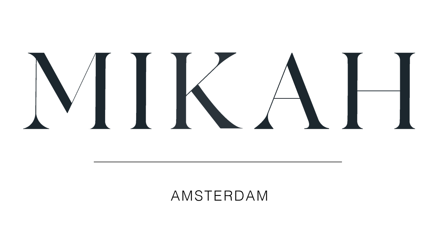 Logo with the word MIKAH and the text Amsterdam below it.