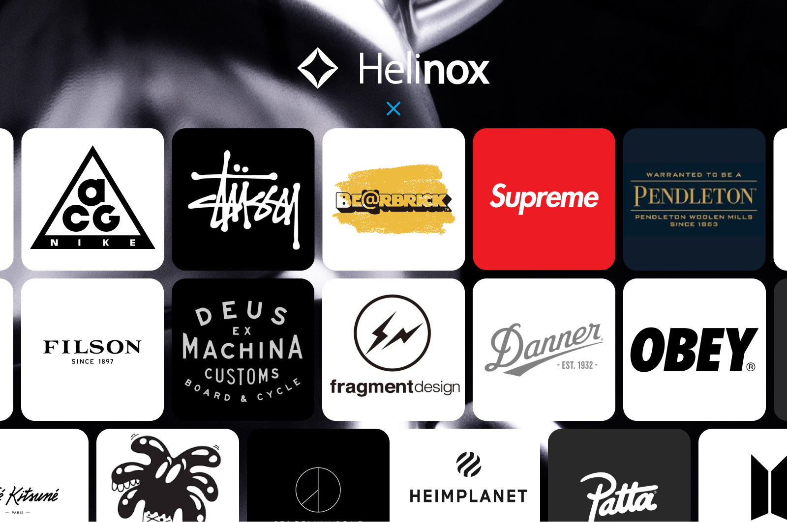 Grid of various brand logos including Nike ACG, Stussy, Bearbrick, Supreme, Pendleton, Filson, Deus Ex Machina, Fragment Design, Danner, Obey, Kitsuné, Heimplanet, Patta, and others under Helinox branding.