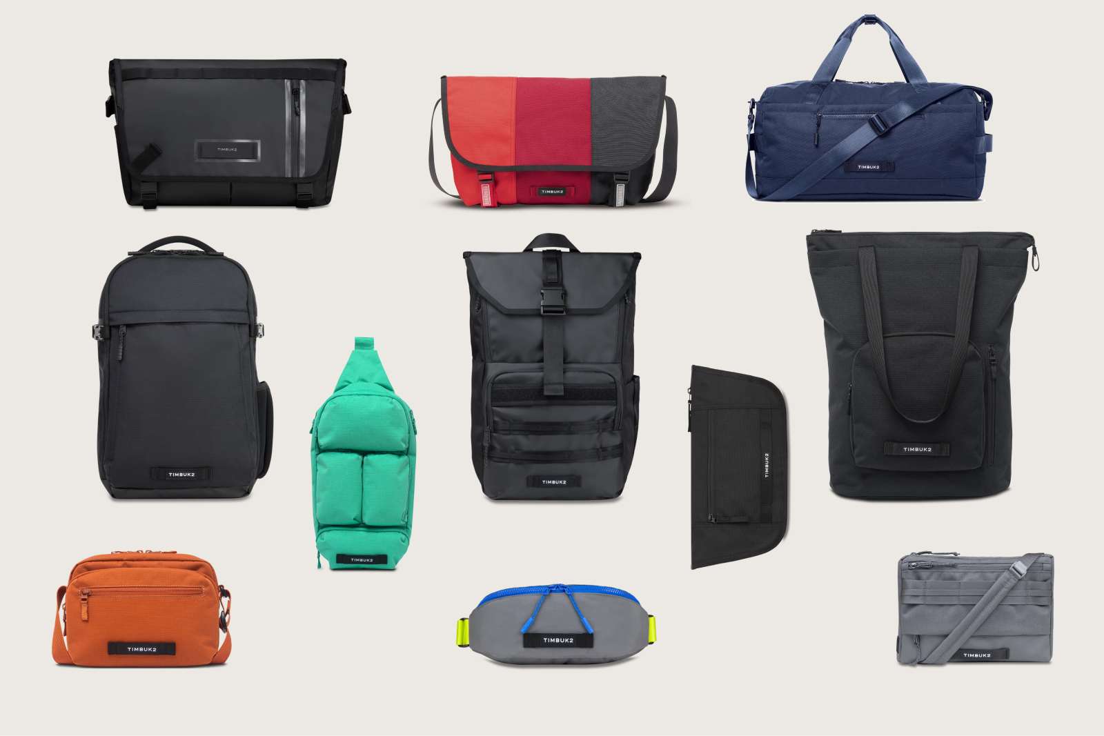 Various Timbuk2 bags including backpacks, crossbody bags, duffel, sling bag, waist pack, and tote bag in different colors arranged on a light background.