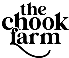 Black text logo saying 'the chook farm' with a decorative underline below 'farm'.