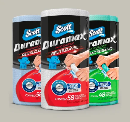 Três rolos de panos reutilizáveis Scott Duramax para limpeza, com embalagens nas cores azul, branca e verde.