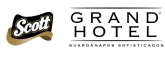 Logotipo da marca Scott em fundo preto e dourado.