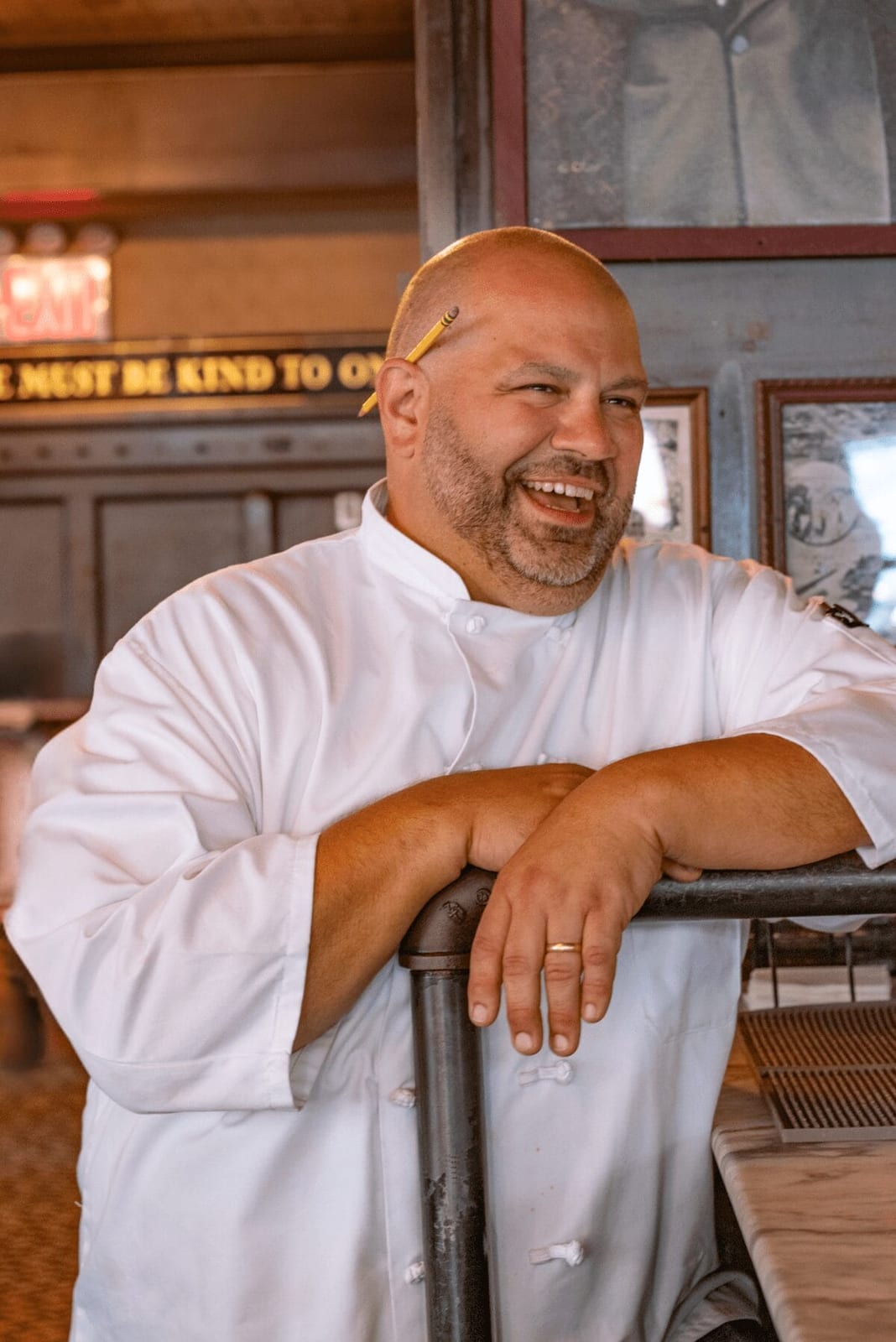 Chef Mike Defonzo poses inside P.J. Clarke’s restaurant