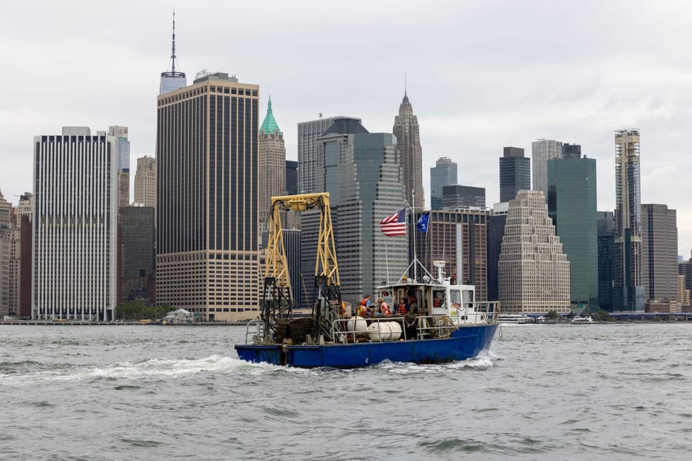 Workboat carries reef structures across New York Harbor