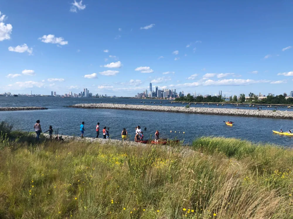 Bush Terminal Park shoreline and harbor under a blue sky