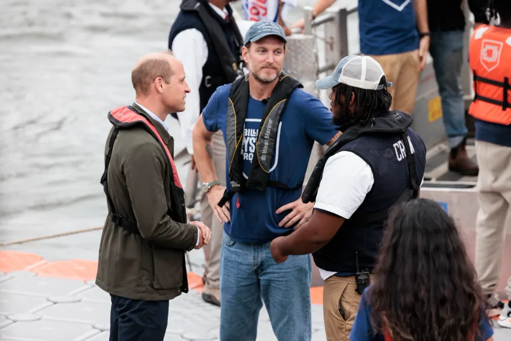 Prince William speaks with Billion Oyster Project staff at a restoration site
