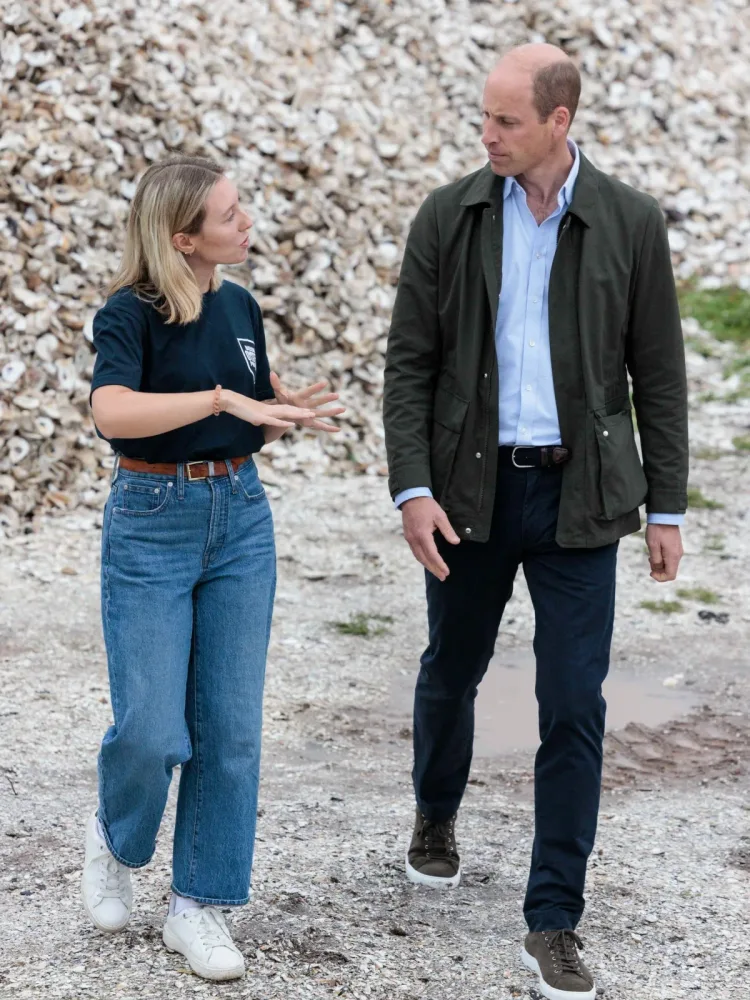 Prince William walks with a Billion Oyster Project staff member