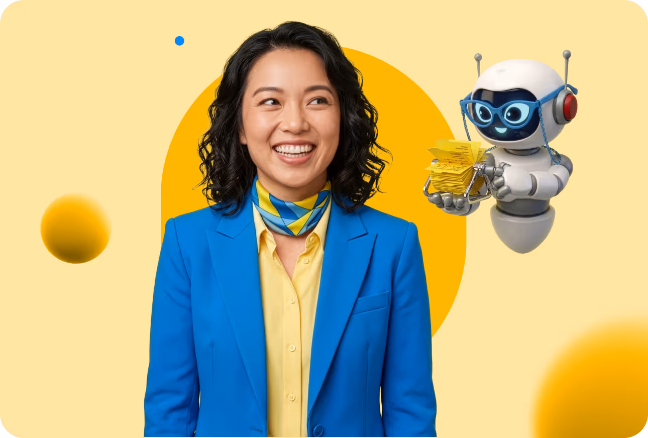 Smiling woman in blue blazer and yellow shirt looking to the side next to a small robot holding yellow notes.