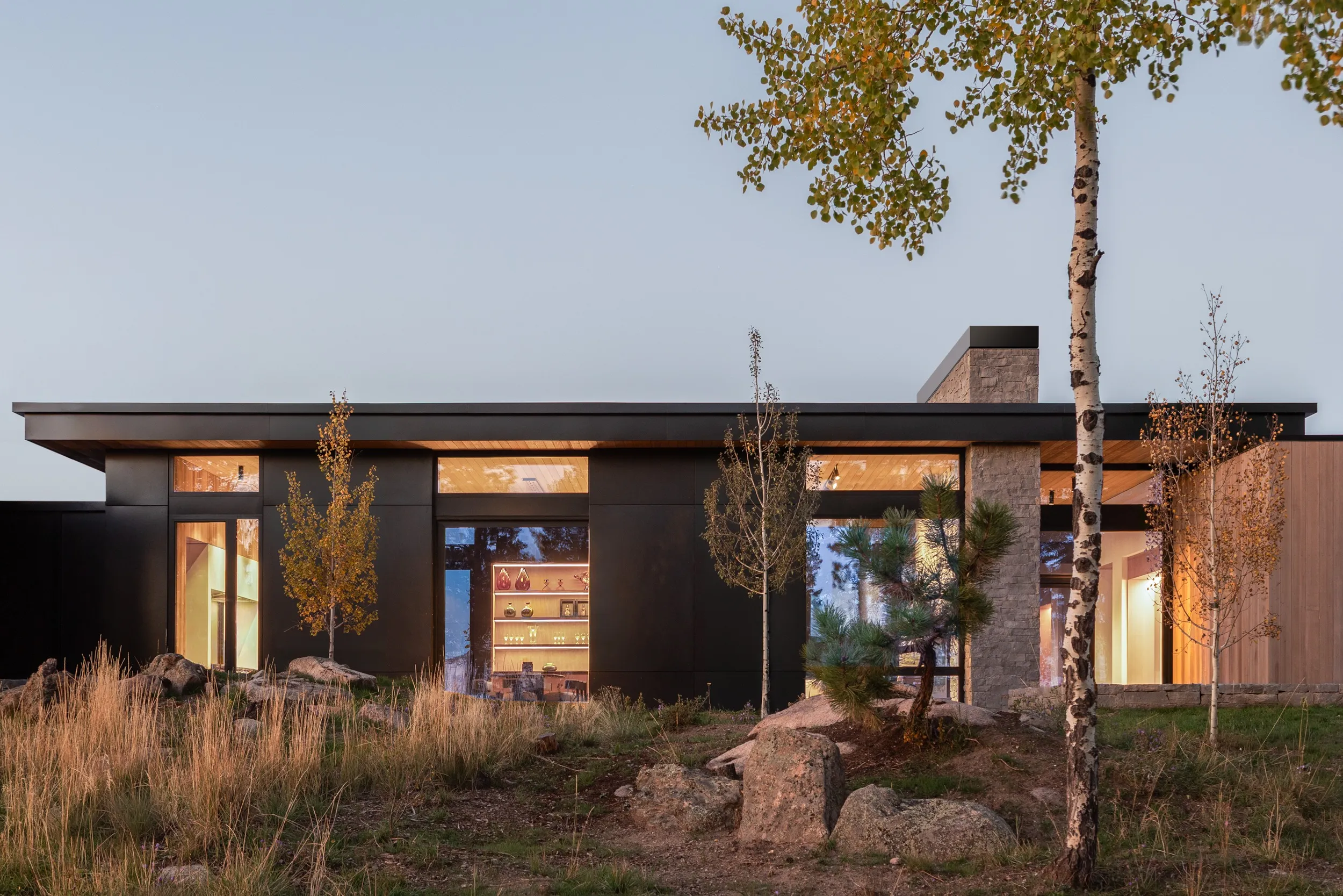 Exterior front elevation dusk in a Evergreen smart home by QAV