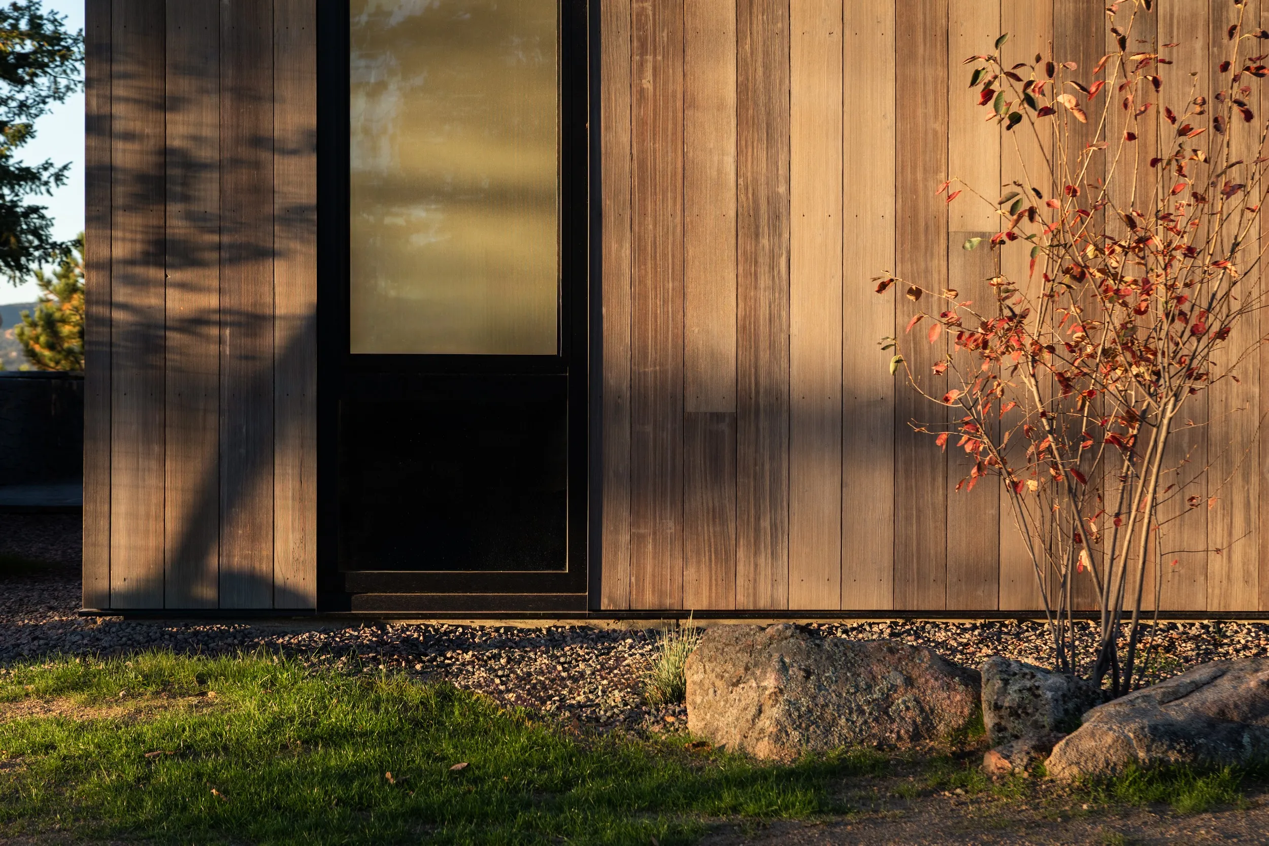 Exterior dark wood siding window golden, the QAV team in Colorado