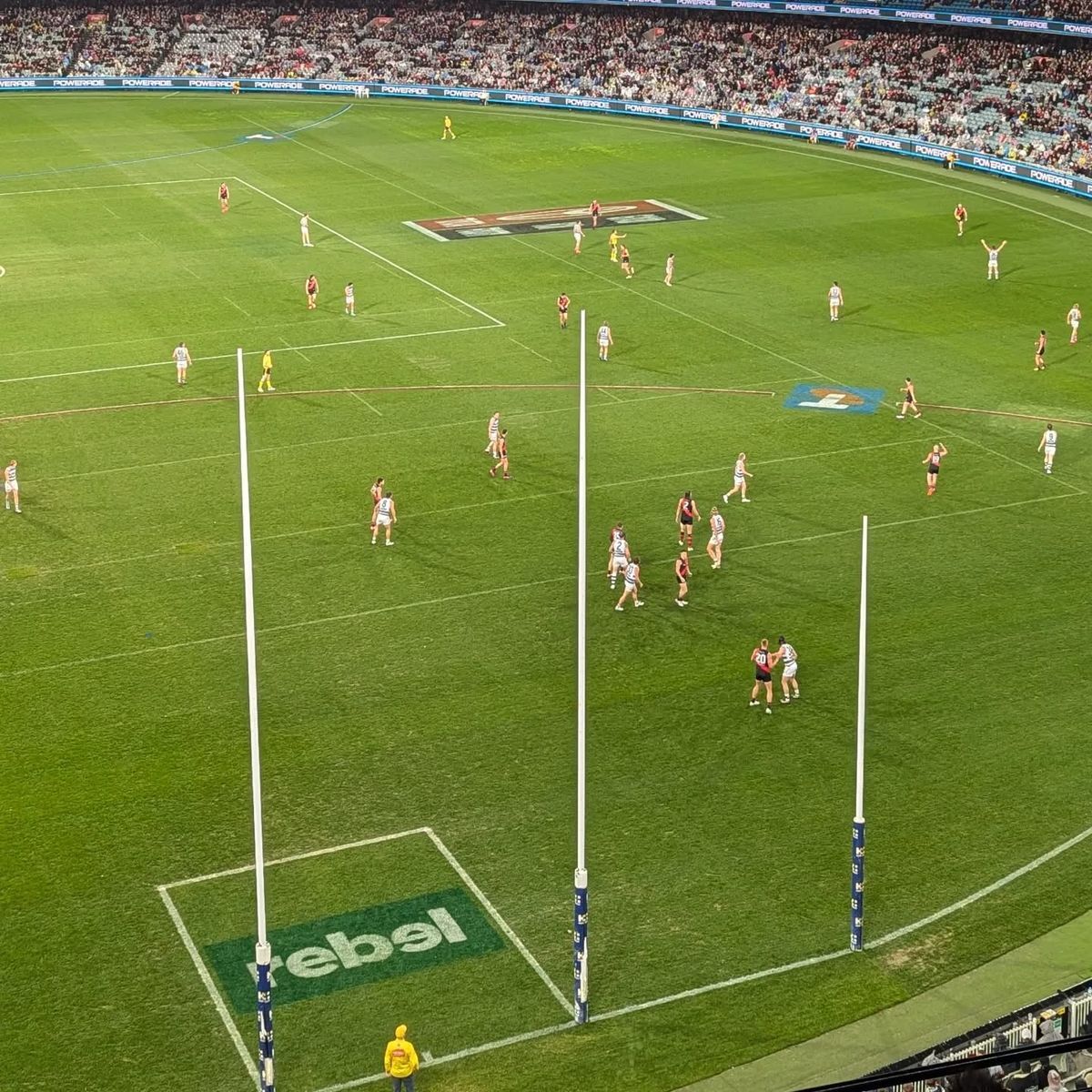 image of technicians inspecting crops