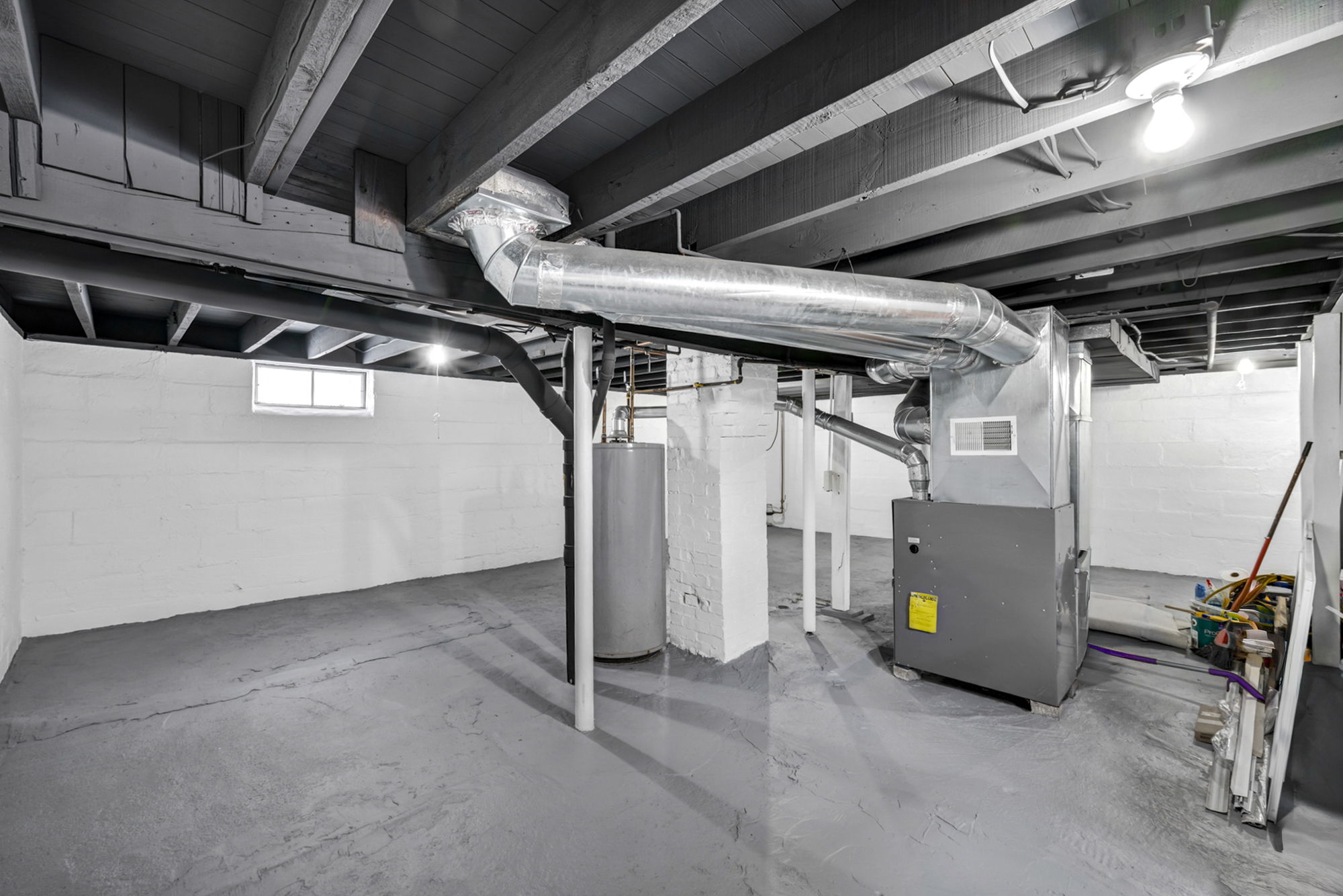 basement full view with stairs and mechanics