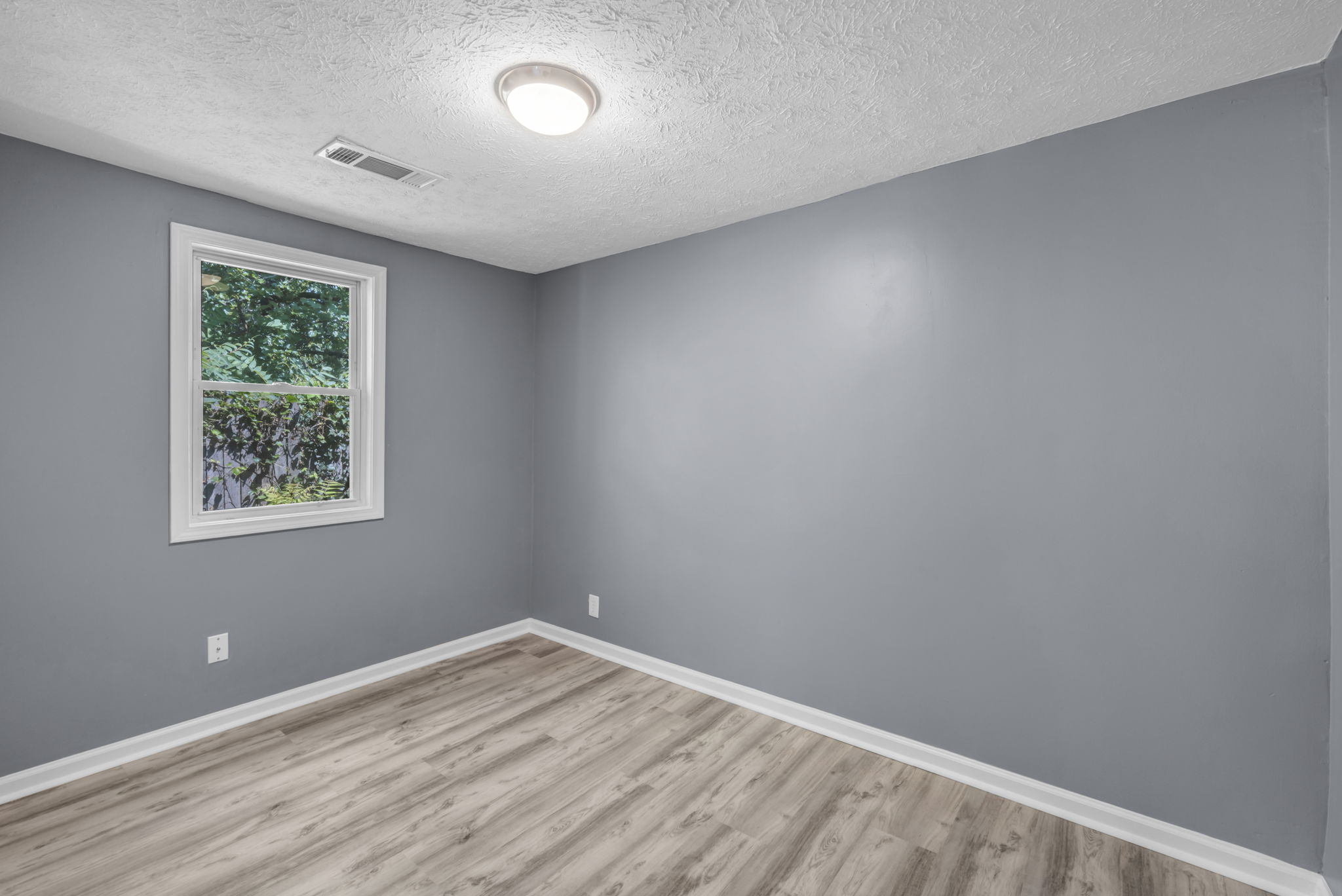 second photo of living room with window