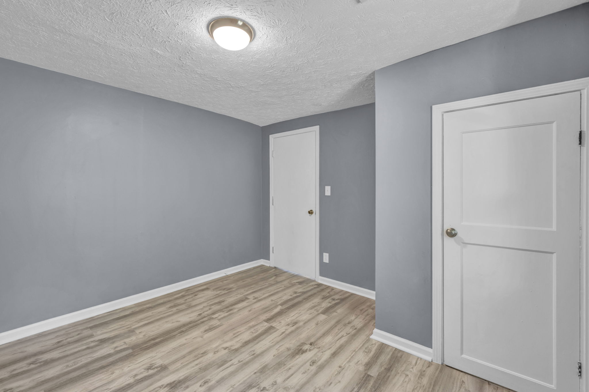 closet and exit photo in bedroom