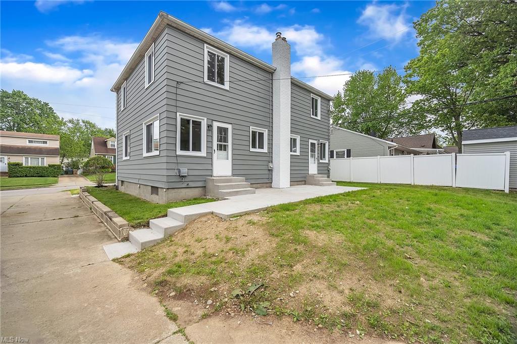 duplex backyard with new concrete stairs