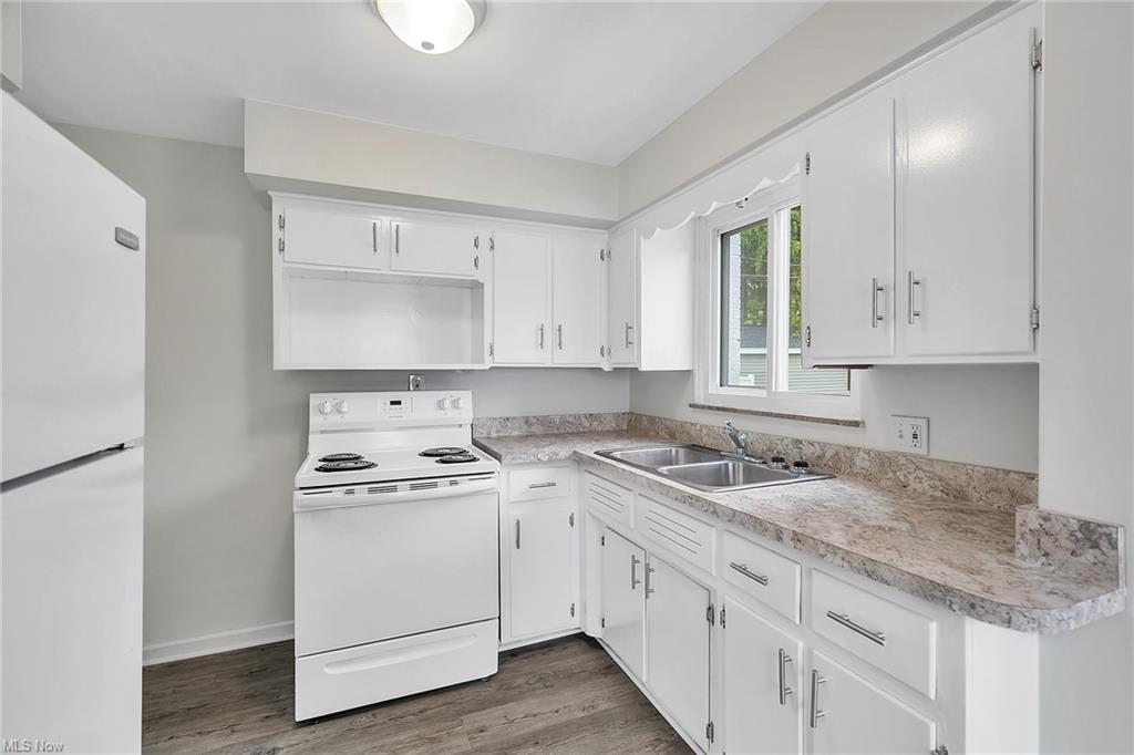 angle photo of kitchen countertop and cabinets
