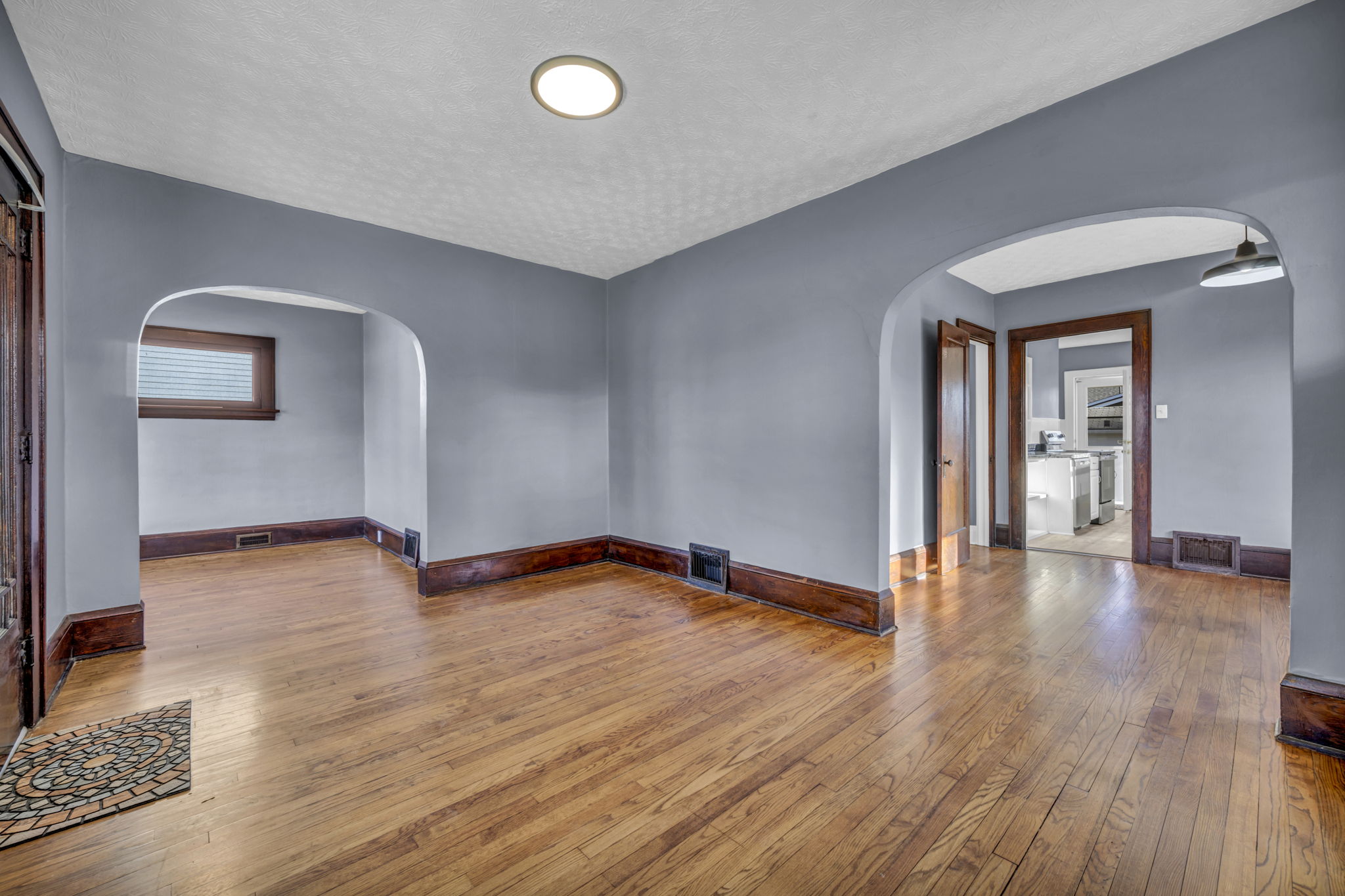 living room and dining room both in view wide view lots of hardwood