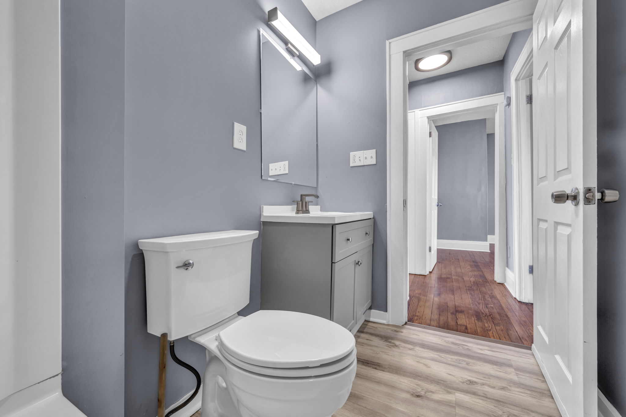 bathroom with toilet and vanity