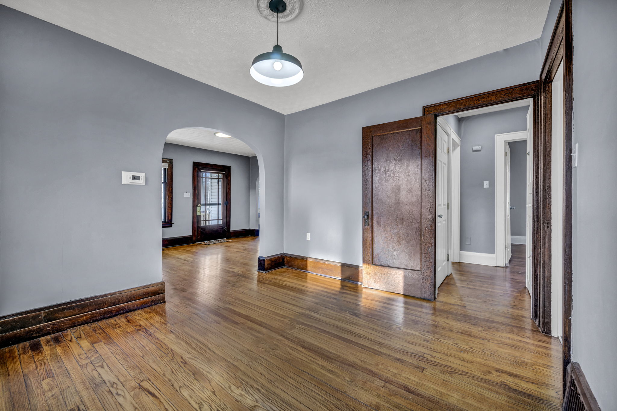 interior with grey paint and hardwood floors