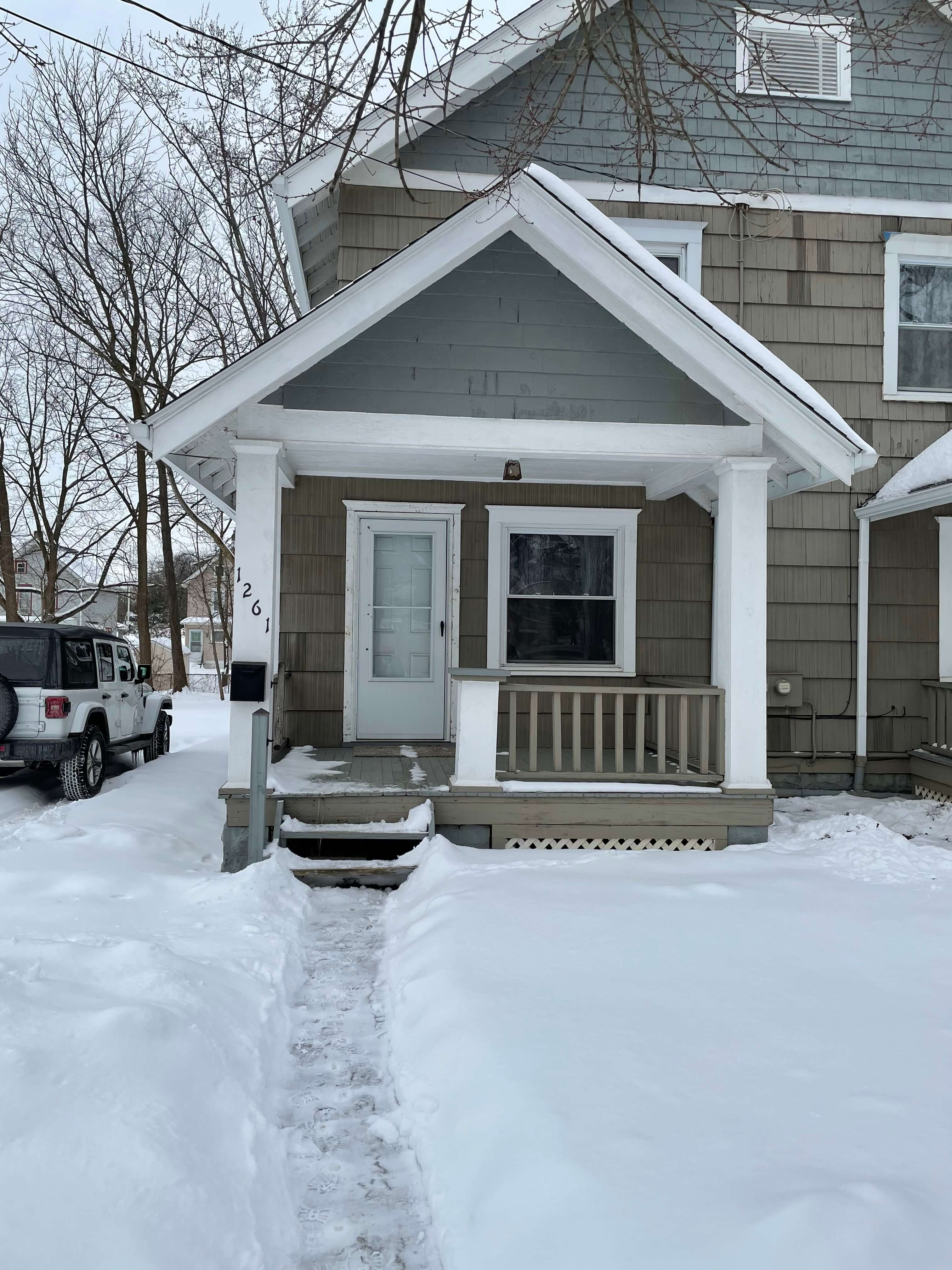 snowy entrance to an apartment