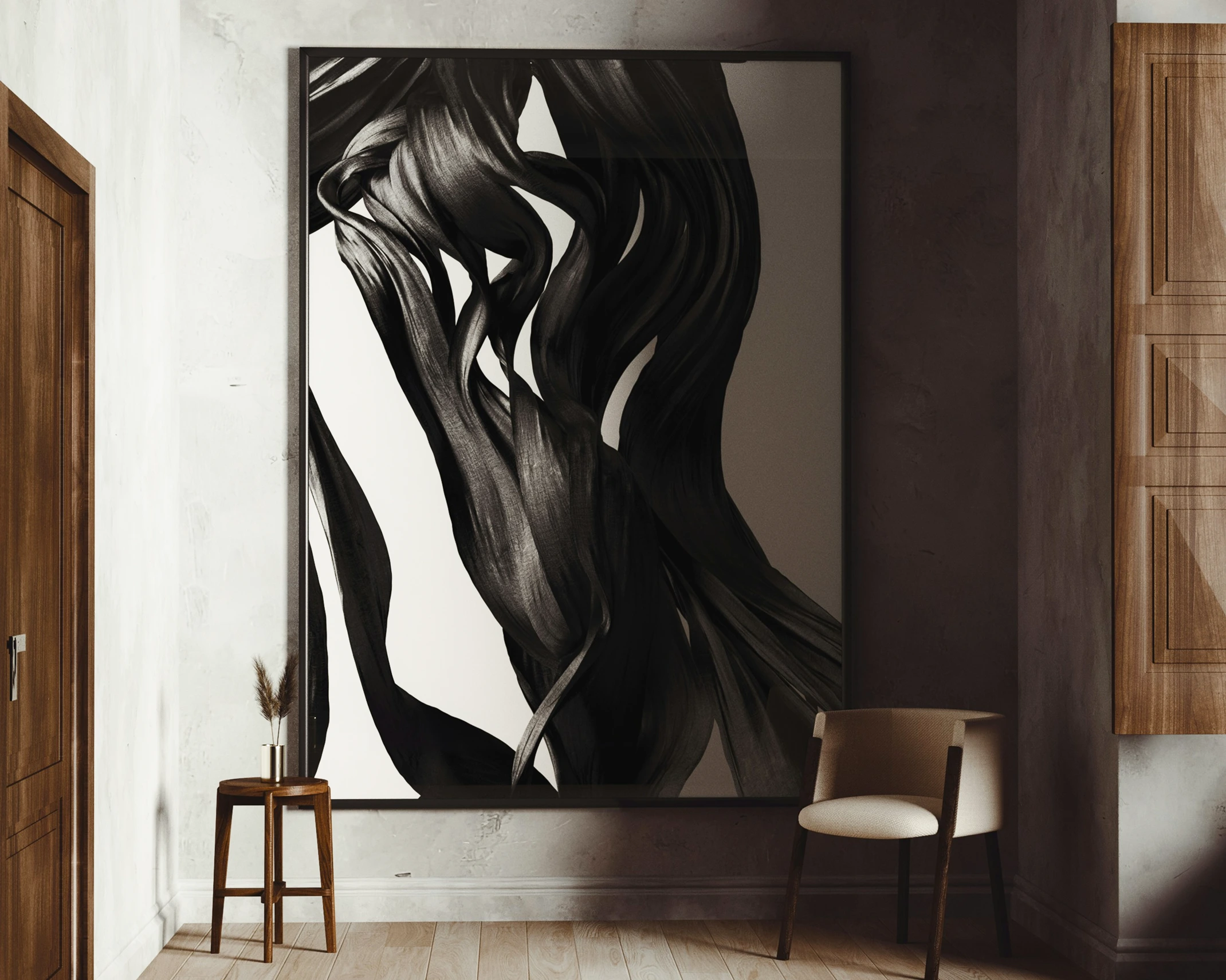 Minimal interior space with a chair and side stool, featuring a large abstract black artwork on a neutral wall.