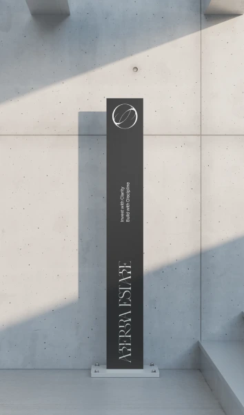 Vertical exterior sign displaying the Aterra Estate logo.