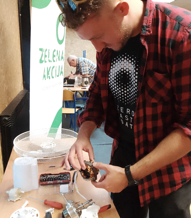 a person repairing electronics