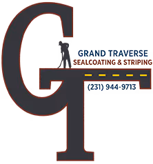 Official logo of Grand Traverse Sealcoating & Striping—the local authority for professional asphalt sealcoating, crack repair, and line striping in Traverse City, Michigan.