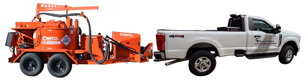 Grand Traverse Sealcoating & Striping mobile asphalt repair unit equipped with a Crafco hot rubber crack sealer for high-durability infrastructure maintenance in the Grand Traverse region.