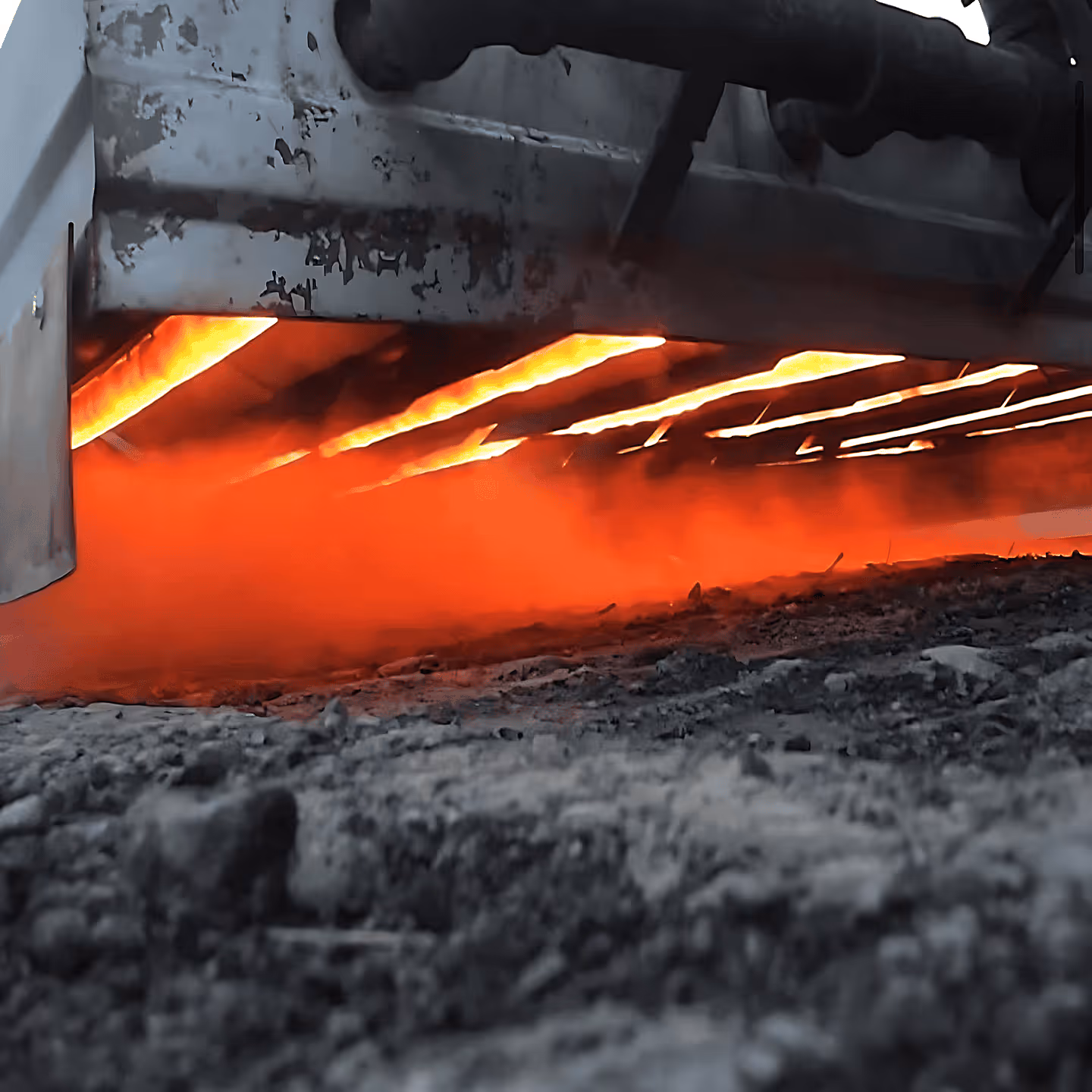 Grand Traverse Sealcoating & Striping utilizing infrared heaters to revitalize asphalt surfaces in Northern Michigan, ensuring a permanent and water-resistant repair.