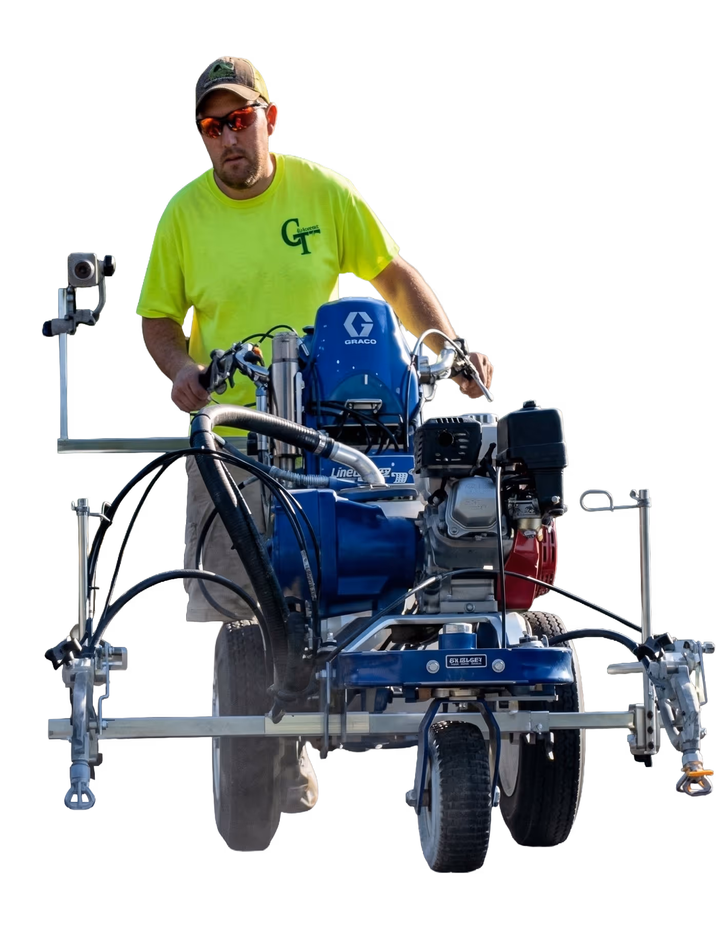 A professional Grand Traverse Sealcoating technician operating a Graco LineLazer striping machine to apply crisp, high-visibility lines on a fresh asphalt parking lot in Traverse City, MI.