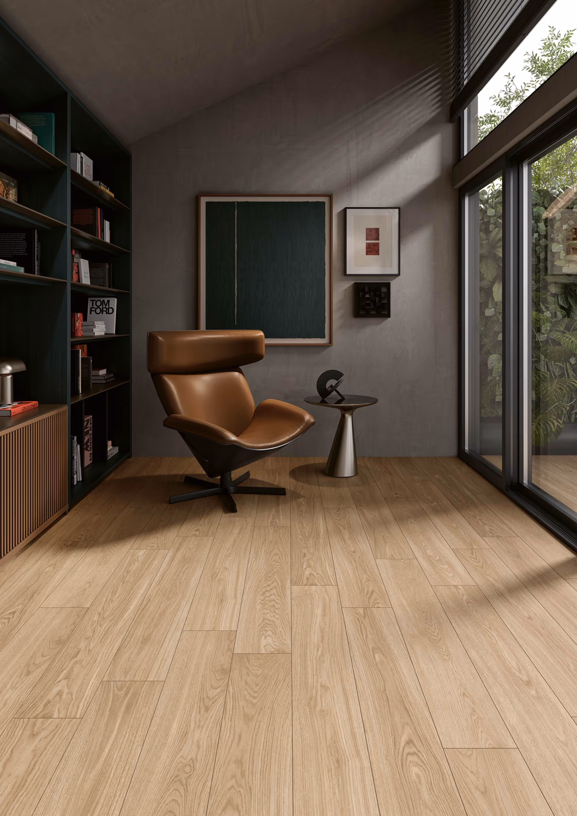 Modern room with light wood floor, brown leather chair, black side table, dark shelves, and large windows.